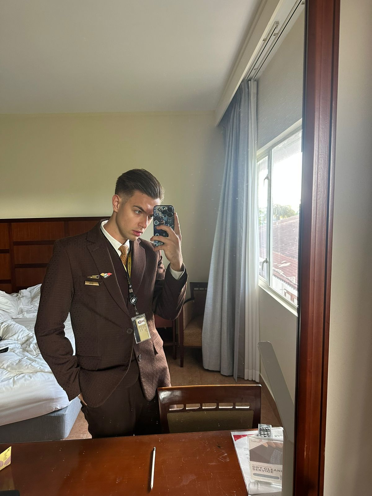 Pavlo in airline cabin crew uniform